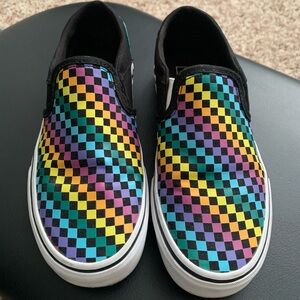 Women’s slip on Vans checkered shoes